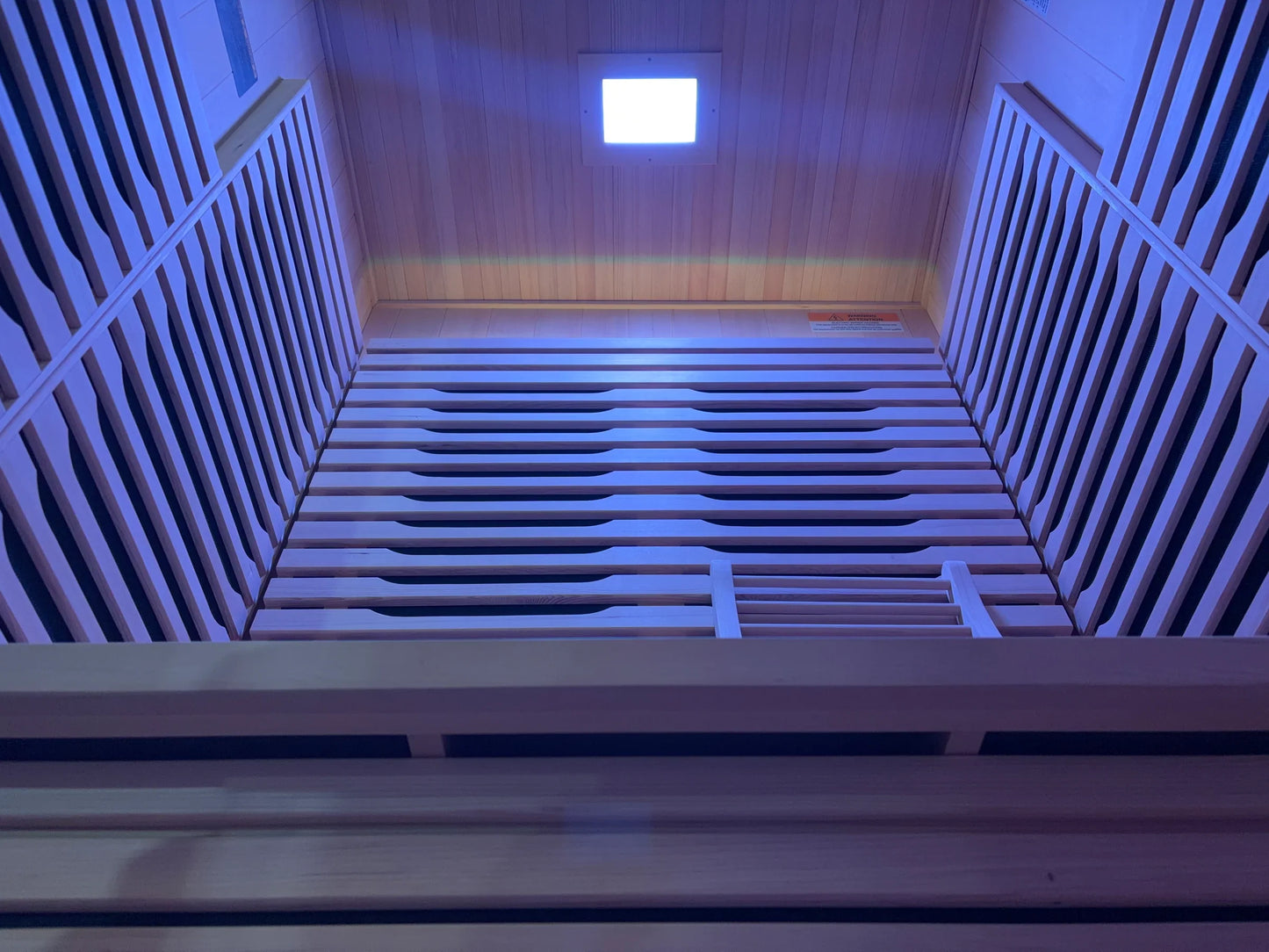 Blisspod wooden sauna purple lighting interview view alternate